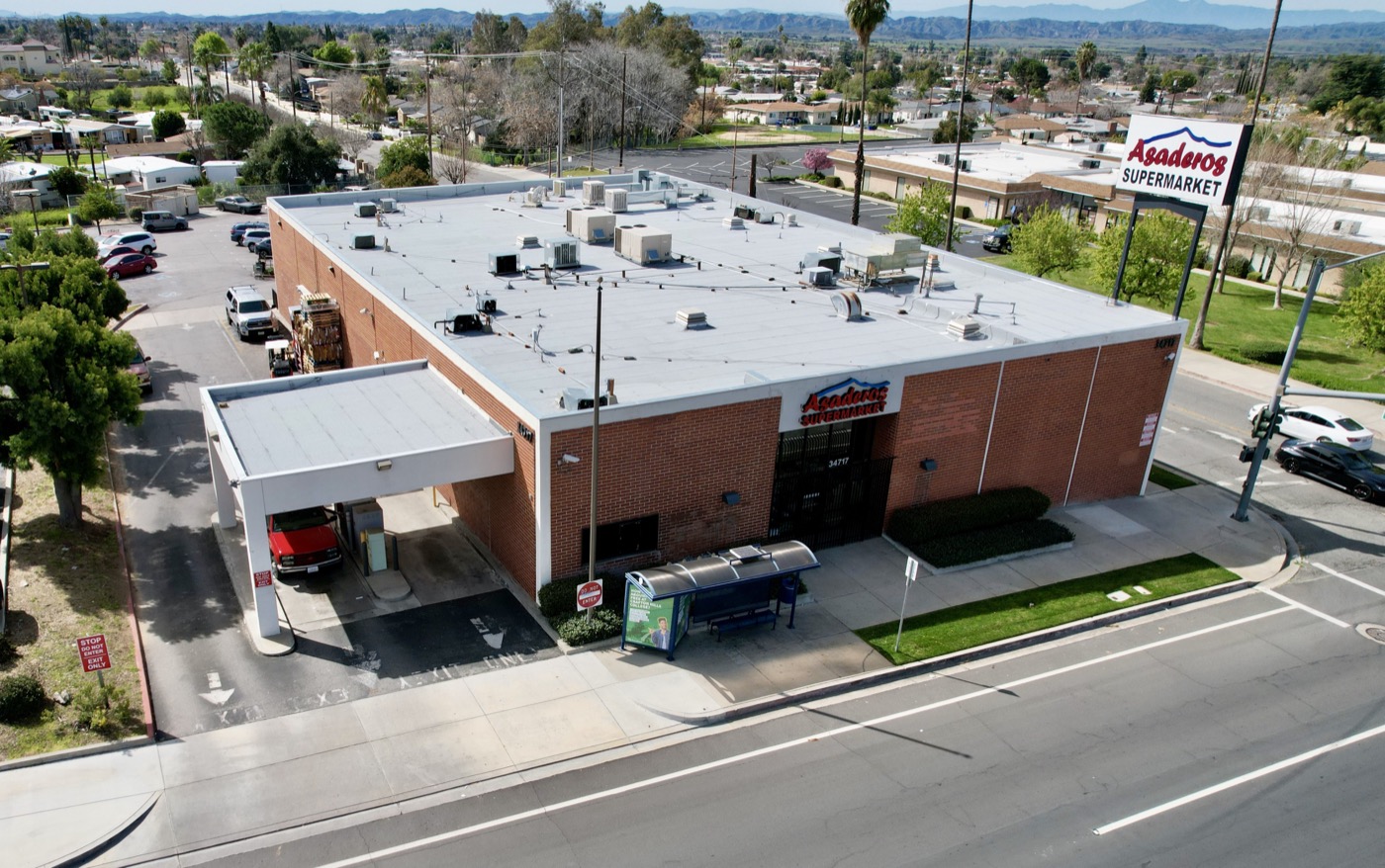 Asaderos Supermarket storefront sign on Yucaipa Boulevard